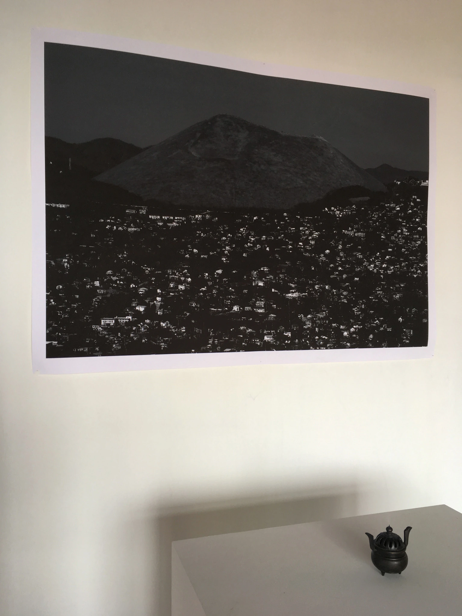 Mt. Omuro photograph and incense burner in Domestic Jealousy