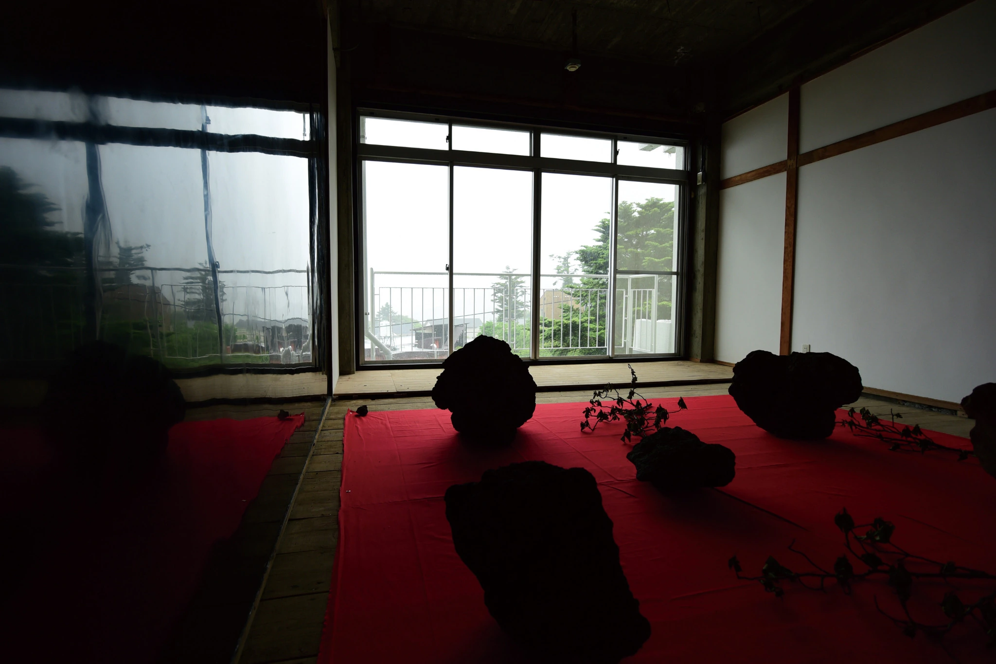 Dark installation view of Domestic Jealousy