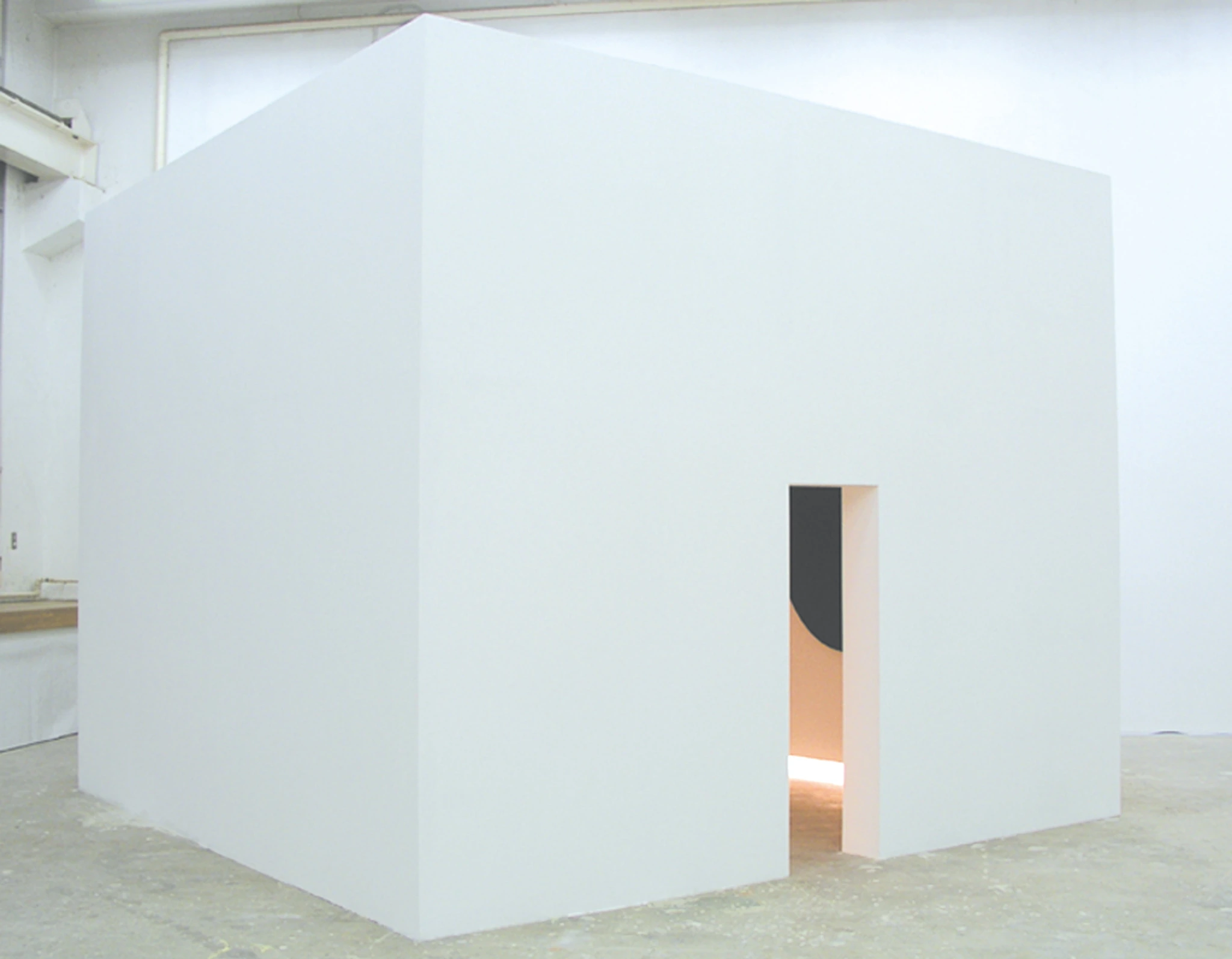 Exterior view of the white exhibition booth at Tokyo University of the Arts