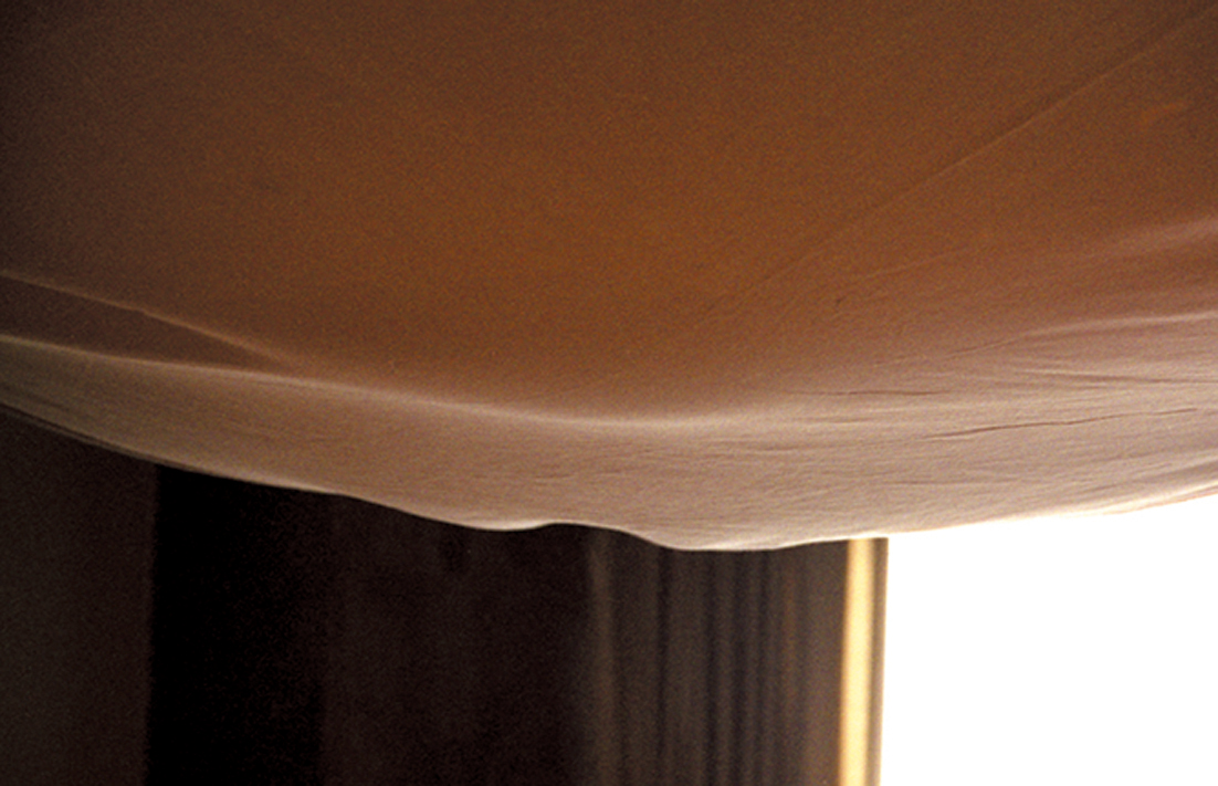 Close view of droplets along the cloth edge